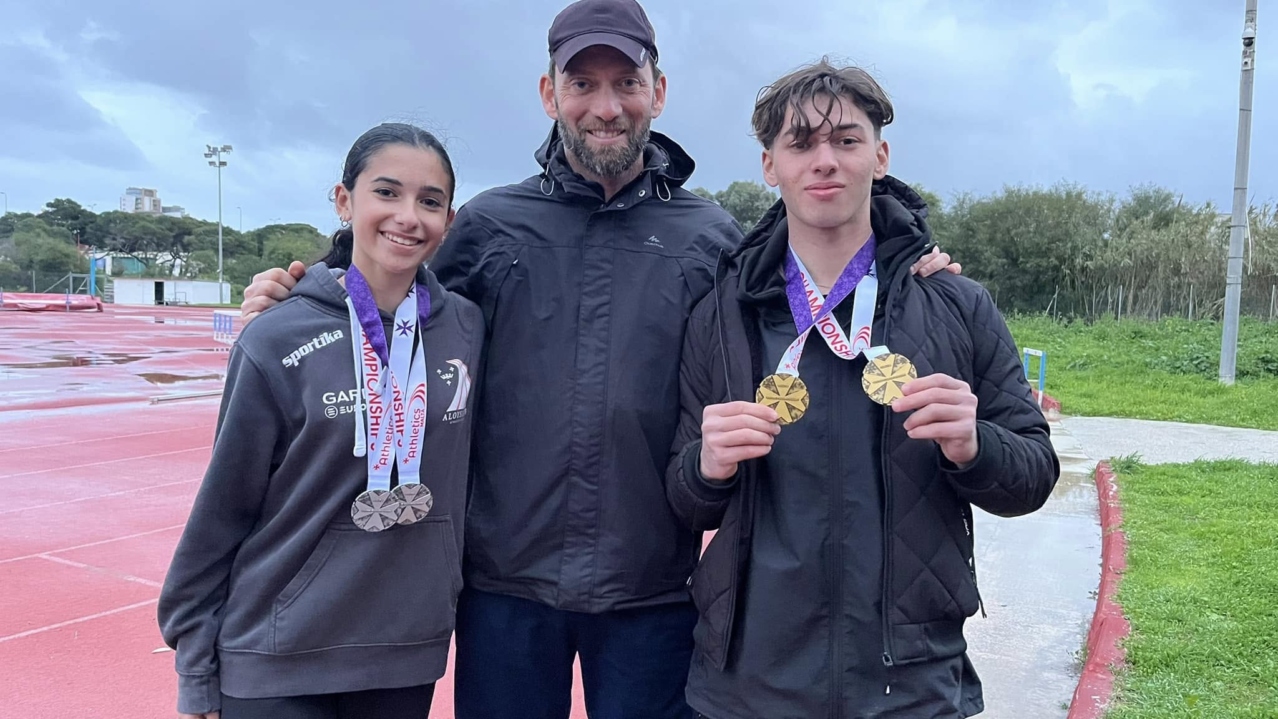 Coach Edward Grech (centre) together with Raquela Calleja (left) and Andrea Grech. Photo: James Azzopardi/Athletics Malta